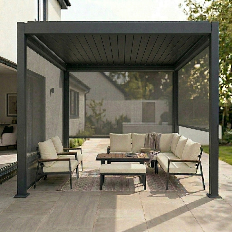 Meridian aluminium louvred pergola in Graphite Grey with side blinds in a UK garden