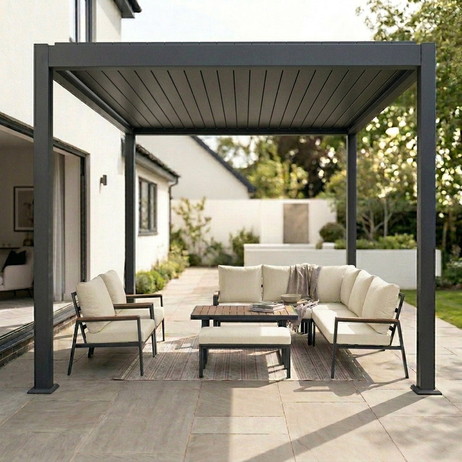 Meridian 4m x 3m aluminium louvred pergola in Graphite Grey over a garden patio
