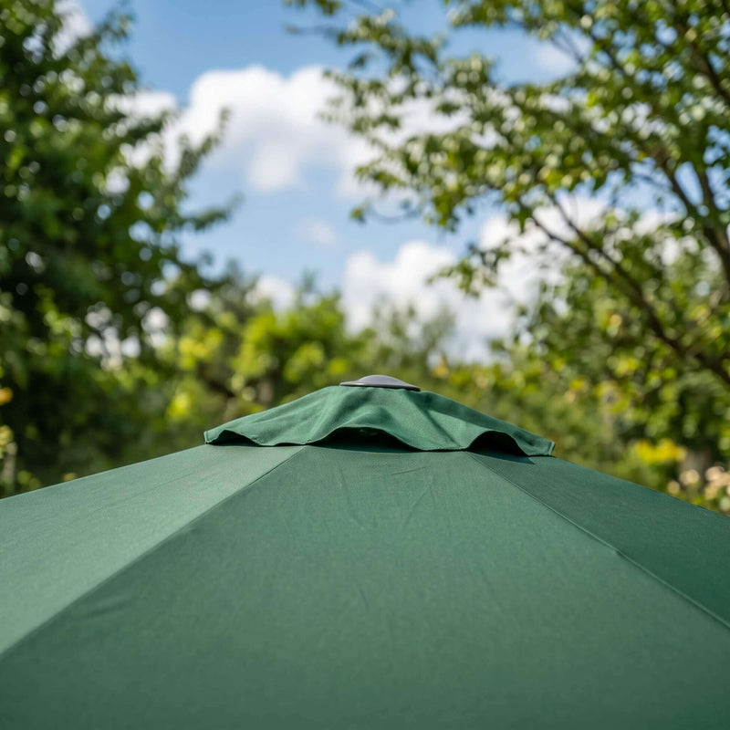 Up close shot of green 3m centre pole parasol canopy with vent at the top
