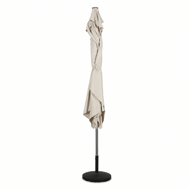 Beige patio umbrella with stand on a white background losed