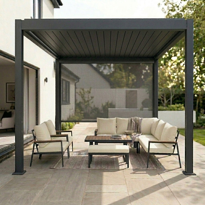 Outdoor patio with pergola, furniture, and view of a house and trees.