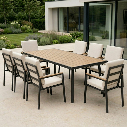 Outdoor dining set with a wooden table and chairs on a patio.